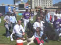 On the field with the team